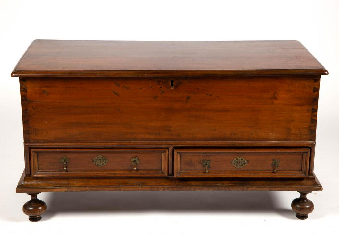 AMERICAN WILLIAM AND MARY GUM / BIRCH BLANKET CHEST: AMERICAN WILLIAM AND MARY GUM / BIRCH BLANKET CHEST, one-board hinged lid over dovetailed case with lidded till and valuables drawers, two short drawers below, applied base molding, the whole raised o