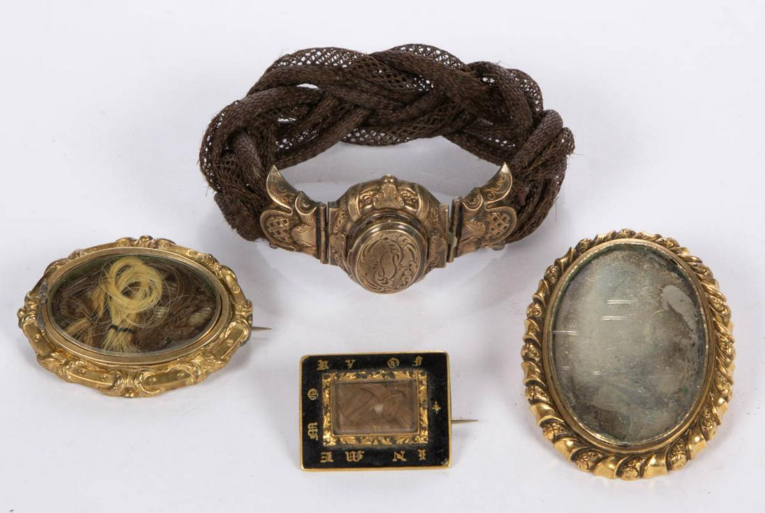 VICTORIAN HAIR-WORK AND OTHER MOURNING JEWELRY: VICTORIAN HAIR-WORK AND OTHER MOURNING JEWELRY ARTICLES, LOT OF FOUR, comprising a bracelet with braided woven-hair band and gold-filled clasp featuring locket concealing additional woven hair, a rect