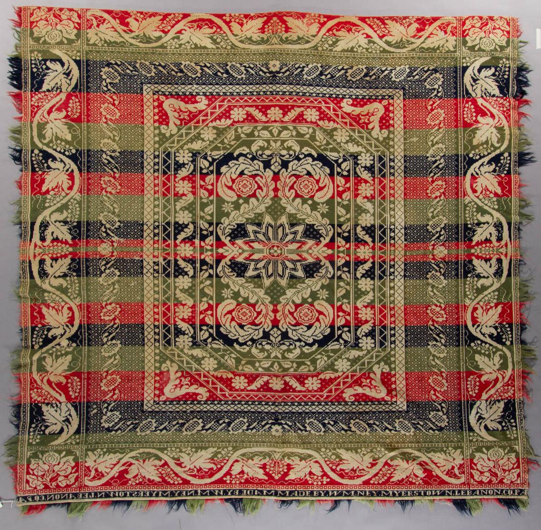 LEBANON CO., PENNSYLVANIA SIGNED JACQUARD COVERLET: LEBANON CO., PENNSYLVANIA SIGNED JACQUARD COVERLET, dark blue, green, and red wool, and light blue and natural cotton, one panel, center 12-point star medallion with four rosettes in the corners havin