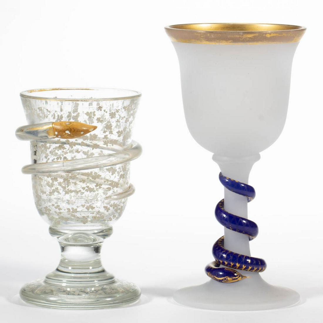 BOHEMIAN GLASS WITH SERPENT GOBLETS, LOT OF TWO: BOHEMIAN GLASS WITH SERPENT GOBLETS, LOT OF TWO, comprising a colorless example with colorless serpent with white floral decoration, and an alabaster/clambroth example with a cobalt blue serpent with 