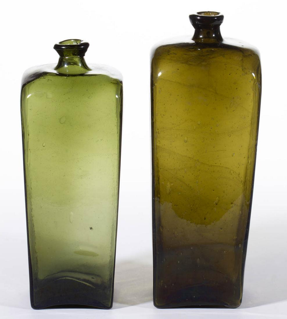 DUTCH / BELGIAN CASE / CASE-GIN BOTTLES, LOT OF TWO: DUTCH / BELGIAN CASE / CASE-GIN BOTTLES, LOT OF TWO, medium olive green and medium olive amber, slightly tapered square form, each with applied crude mouth and kick-up base with rough pontil mark, one