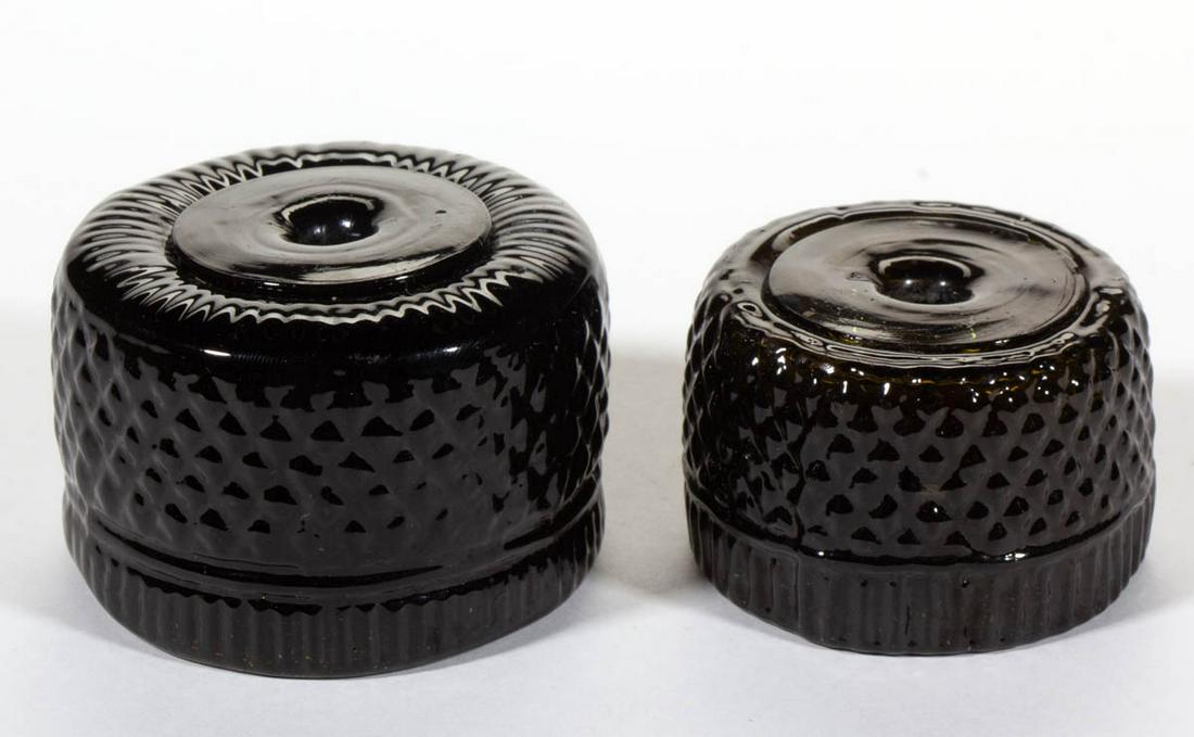 BLOWN-MOLDED THREE MOLD INKWELLS, LOT OF TWO: BLOWN-MOLDED THREE MOLD INKWELLS, LOT OF TWO, deep olive green, comprising a GII-16 and a GII-18 example, rough pontil mark. Boston & Sandwich Glass Co. and others. 18250-1835. 1 5/8" to 1 7/8" H, 2 1