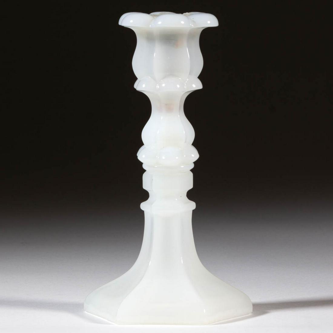 PRESSED PETAL AND HEXAGONAL CANDLESTICK: PRESSED PETAL AND HEXAGONAL CANDLESTICK, alabaster/clambroth, six-petal socket with a hexagonal extension, raised on a hexagonal knop and flared base, wafer construction. Boston & Sandwich Glass Co. a