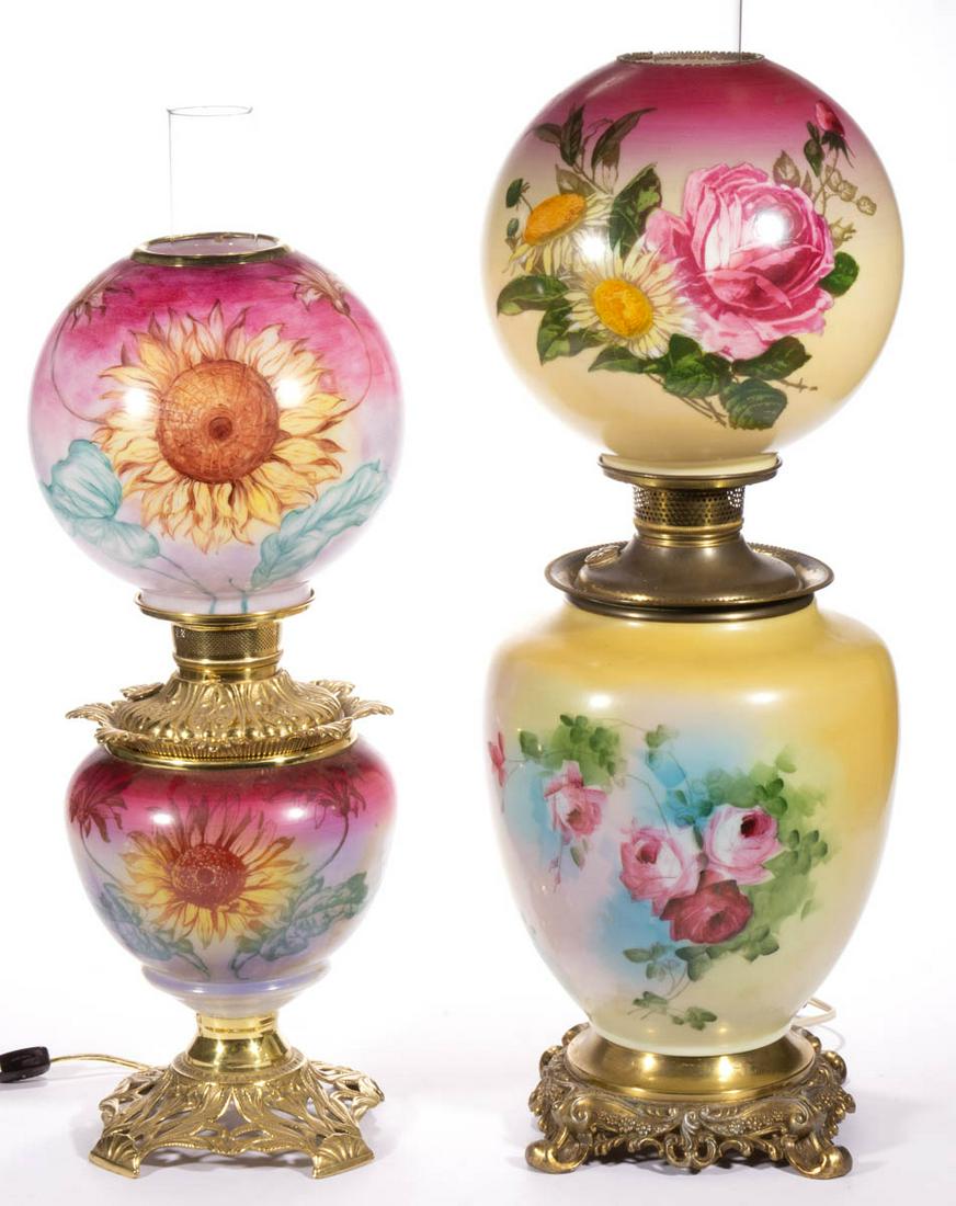 VICTORIAN DECORATED OPAL KEROSENE GONE WITH THE WIND /: VICTORIAN DECORATED OPAL KEROSENE GONE WITH THE WIND / PARLOR LAMPS, LOT OF TWO, opaque white with polychrome-enamel decoration, each having a ball-form shade with floral decoration, one with non-matc