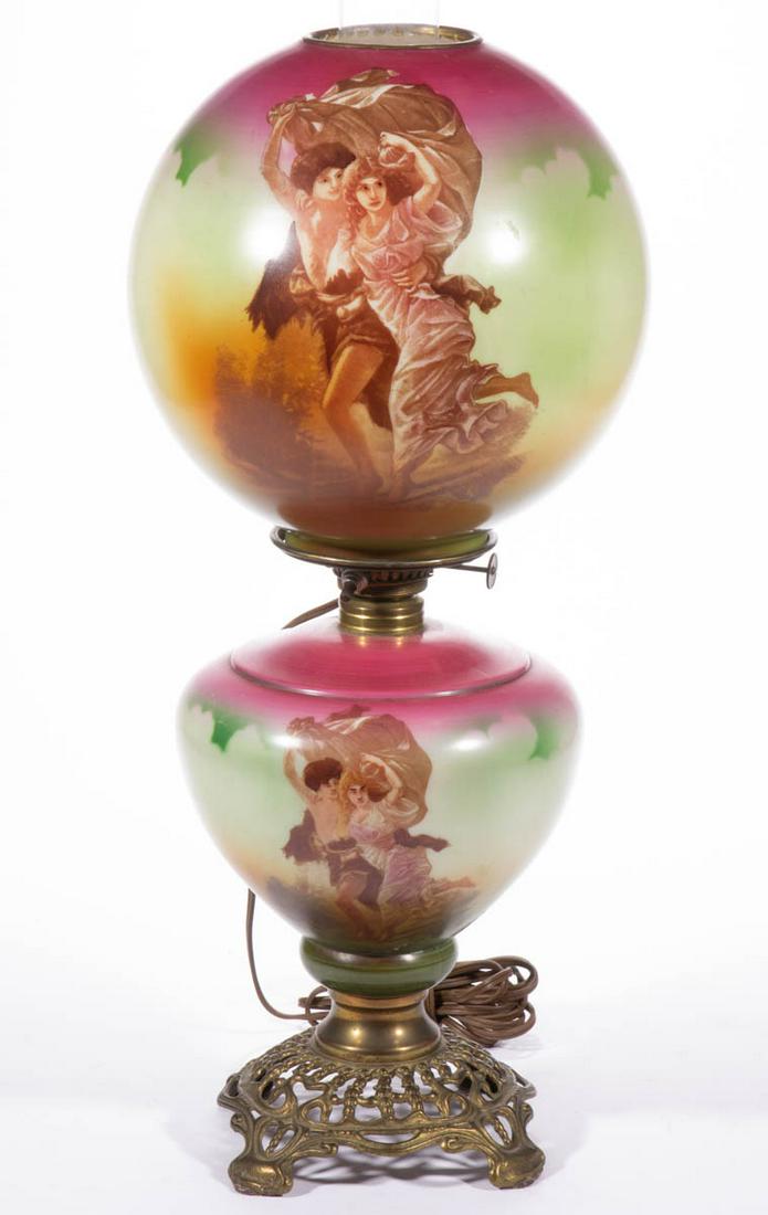 VICTORIAN ENAMEL-DECORATED GONE WITH THE WIND / PARLOR: VICTORIAN ENAMEL-DECORATED GONE WITH THE WIND / PARLOR LAMP, opaque white with polychrome-enamel decoration and ground, matching ball-form shade with decoration depicting a man and woman running with
