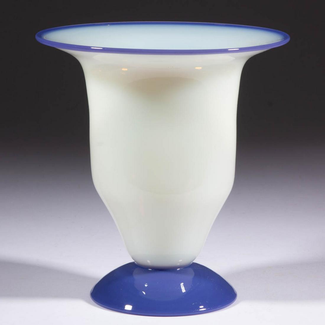 UNLISTED FRY FOVAL ART GLASS VASE: UNLISTED FRY FOVAL ART GLASS VASE, opalescent with a Delft foot and rim, polished pontil mark. H. C. Fry Glass Co. First half 20th century. 7 1/2" H, 7" D rim, 4 1/4" D foot.Undamaged.Provenance: From