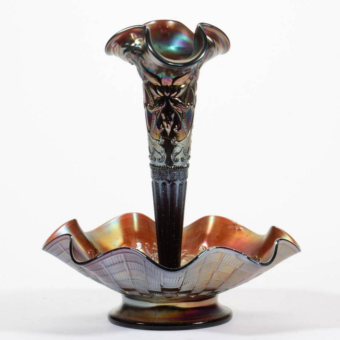 NORTHWOOD WISHBONE CARNIVAL GLASS EPERGNE: NORTHWOOD WISHBONE CARNIVAL GLASS EPERGNE, amethyst, single lily, ruffled-rim bowl with basketweave pattern to exterior. Northwood Glass Co. First quarter 20th century. 9 1/2" HOA. Bowl: 2 3/4" HOA, 8