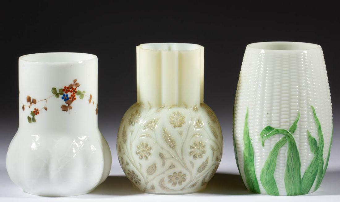 ASSORTED OPAQUE GLASS CELERY VASES, LOT OF THREE: ASSORTED OPAQUE GLASS CELERY VASES, LOT OF THREE, comprising an opaque white Libbey Maize with green staining, a Findlay Onyx, and an opaque white Spider Webb with polychrome-enamel decoration. Variou