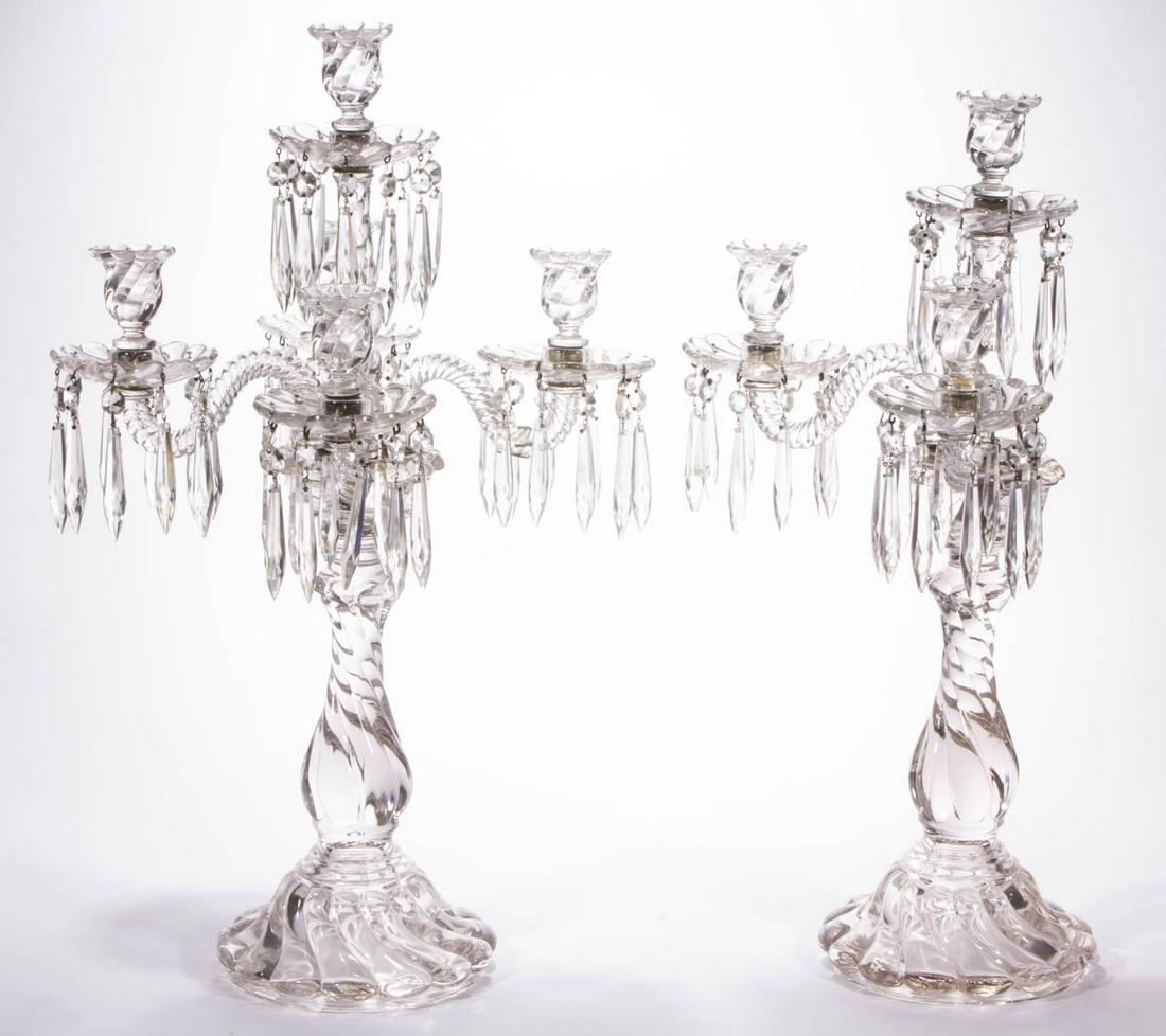 FOSTORIA COLONY PAIR OF CANDELABRAS: FOSTORIA COLONY PAIR OF CANDELABRAS, colorless, each having a large baluster-form base supporting a five-arm top with the arms fitting into a metal central plate, five sockets with matching bobeches a