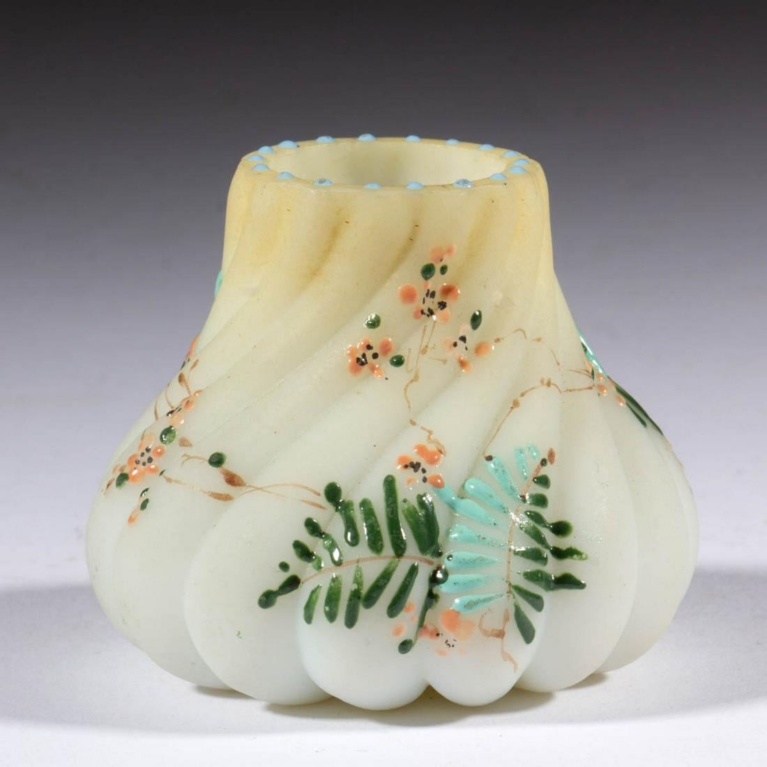 MT. WASHINGTON SWIRLED BEAD-TOP TOOTHPICK HOLDER: MT. WASHINGTON SWIRLED BEAD-TOP TOOTHPICK HOLDER, opal with tan shading and polychrome decoration, beaded rim. Mt. Washington Glass Co. Circa 1890. 2" H. Undamaged. Literature: Parallels Bredehoft/San