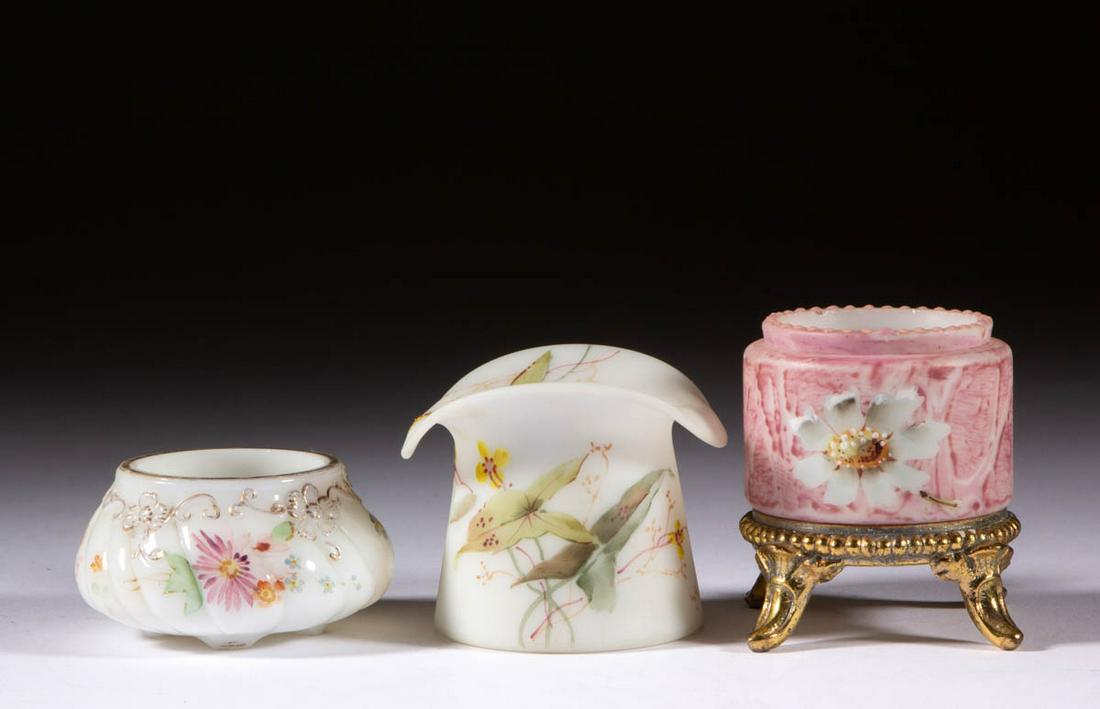ASSORTED OPAQUE GLASS TOOTHPICK HOLDERS, LOT OF THREE: ASSORTED OPAQUE GLASS TOOTHPICK HOLDERS, LOT OF THREE, opaque white with polychrome-enamel decoration, comprising a Mt. Washington hat with floral decoration, and two Wave Crest examples including a K