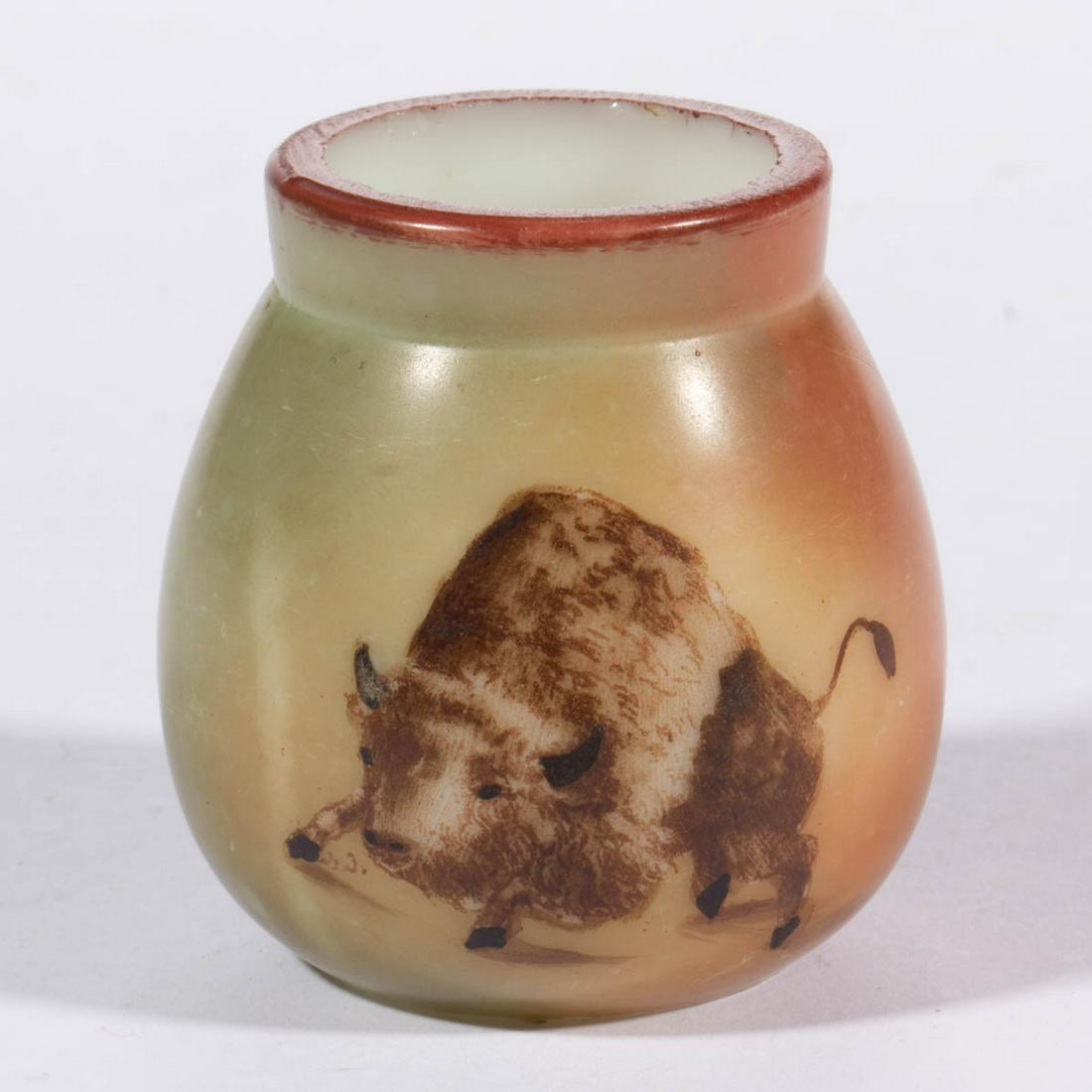 PAIRPOINT TOOTHPICK HOLDER: PAIRPOINT TOOTHPICK HOLDER, opal with painted decoration, depicting a Buffalo and the reverse stating "TOOTHPICKS". Pairpoint Glass Co. Circa 1895. 2 1/4" H. Undamaged with some light wear to the deco