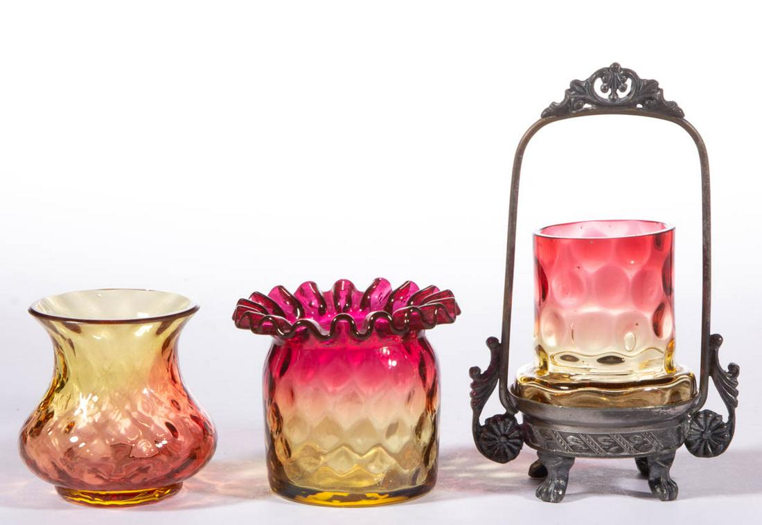 ASSORTED AMBERINA GLASS TOOTHPICK HOLDERS, LOT OF THREE: ASSORTED AMBERINA GLASS TOOTHPICK HOLDERS, LOT OF THREE, comprising a Diamond-Quilt baluster form, a Diamond-Quilt cylindrical form with a ruffled rim, and a Spot-Optic bulged base example fitted into