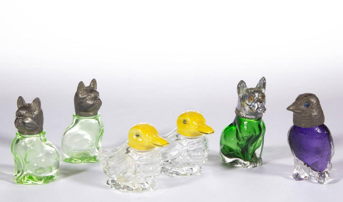 ASSORTED CZECHOSLOVAKIA FIGURAL SALT / PEPPER SHAKERS,: ASSORTED CZECHOSLOVAKIA FIGURAL SALT / PEPPER SHAKERS, LOT OF SIX, comprising two green dogs, two colorless ducks with yellow heads, a green dog with matching lid, and an amethyst crow with a matching