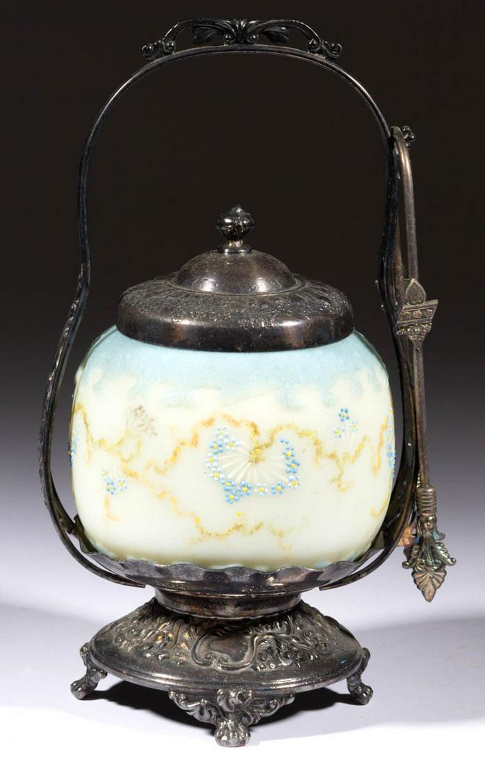MT. WASHINGTON ALBERTINE PICKLE CASTER: MT. WASHINGTON ALBERTINE PICKLE CASTER, opaque white with blue stain and polychrome-enamel decoration, No. 6 White Daisy design, fitted in the original Pairpoint quadruple-plated frame numbered "669",