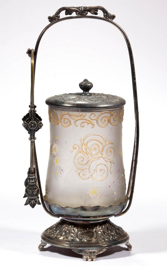 MT. WASHINGTON ROYAL FLEMISH SCROLLS PICKLE CASTER: MT. WASHINGTON ROYAL FLEMISH SCROLLS PICKLE CASTER, frosted colorless with polychrome-enamel and gilt decoration, baluster form with raised scrolls and daisy decoration, fitted into a quadruple-plated