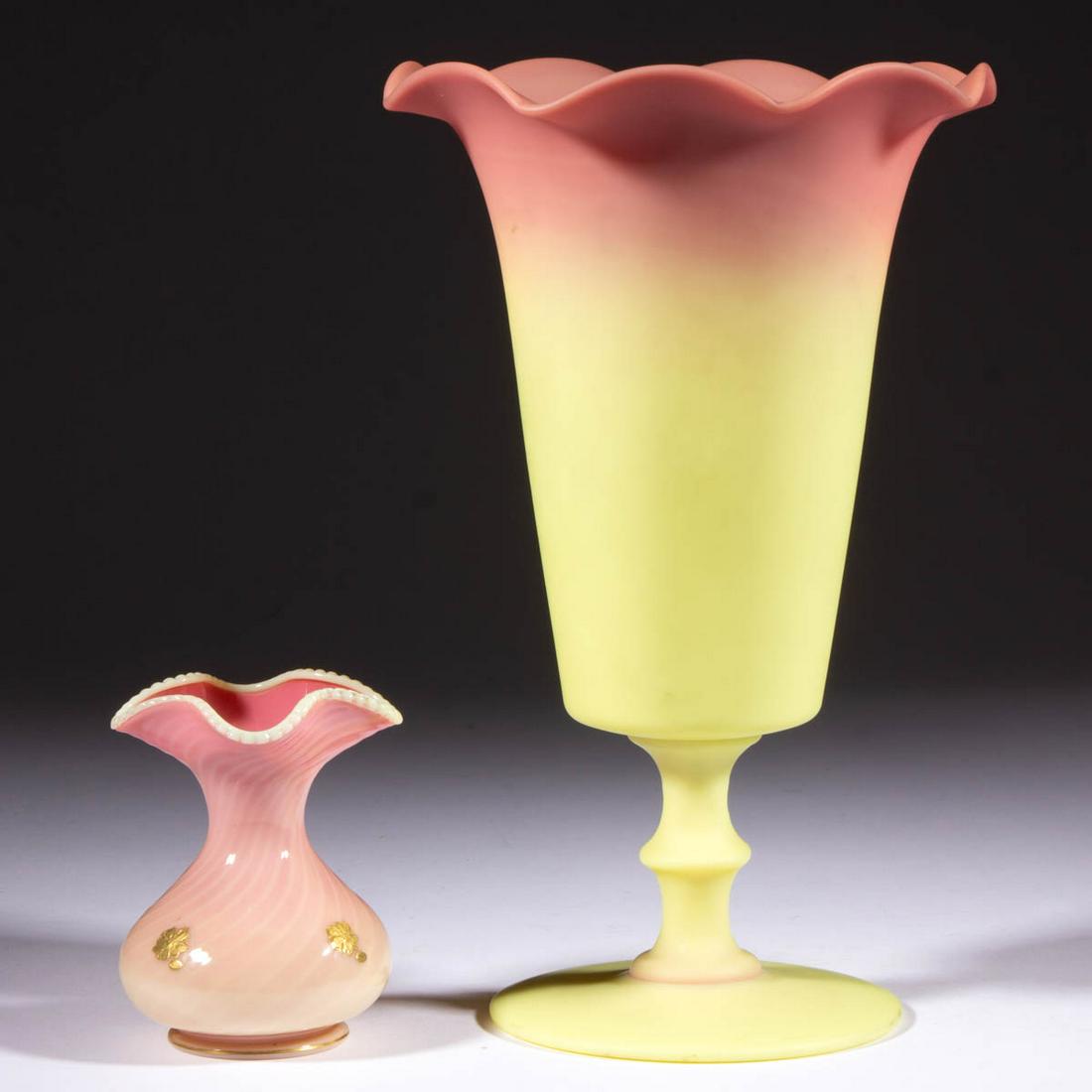ASSORTED BURMESE GLASS ARTICLES, LOT OF TWO: ASSORTED BURMESE GLASS ARTICLES, LOT OF TWO, comprising a large plush vase with a slightly conical bowl, raised on a single-knop stem and circular foot, and a glossy swirled example with an applied be
