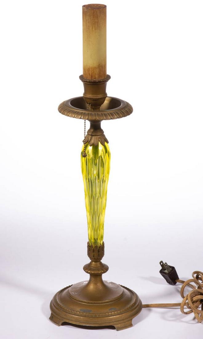 PAIRPOINT CANARIA CUT GLASS CANDLE LAMP: PAIRPOINT CANARIA CUT GLASS CANDLE LAMP, Canaria (reacts under black light), cut glass stem with quadruple-plated mounts with later finish, top having a figural socket sheathe, signed to the underside