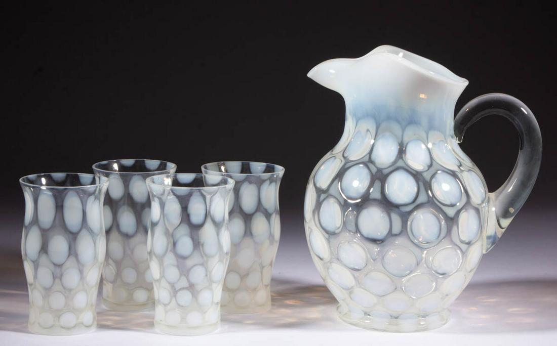 FENTON NO. 1653 COINSPOT FIVE-PIECE ICE TEA SET: FENTON NO. 1653 COINSPOT FIVE-PIECE ICE TEA SET, colorless opalescent, comprising an iced tea pitcher and four iced tea tumblers. Fenton Art Glass Co. Second quarter 20th century. Pitcher: 9 3/4" HOA.