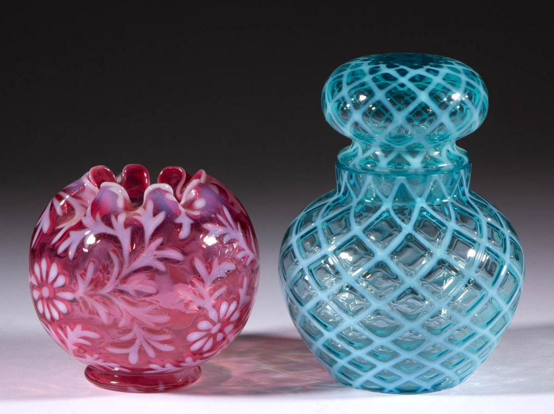 ASSORTED BLOWN OPALESCENT GLASS ARTICLES, LOT OF TWO: ASSORTED BLOWN OPALESCENT GLASS ARTICLES, LOT OF TWO, comprising a blue opalescent Bubble Lattice covered jar, and a cranberry opalescent Daisy and Fern rose bowl. Various makers. Late 19th/early 20th