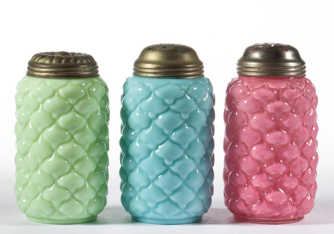VICTORIAN CONE SUGAR SHAKERS, LOT OF THREE: VICTORIAN CONE SUGAR SHAKERS, LOT OF THREE, cased pink, opaque green, and opaque blue, each having a period lid. Consolidated Lamp & Glass Co. Fourth quarter 19th century. 5" to 5 1/4" HOA. Glass unda