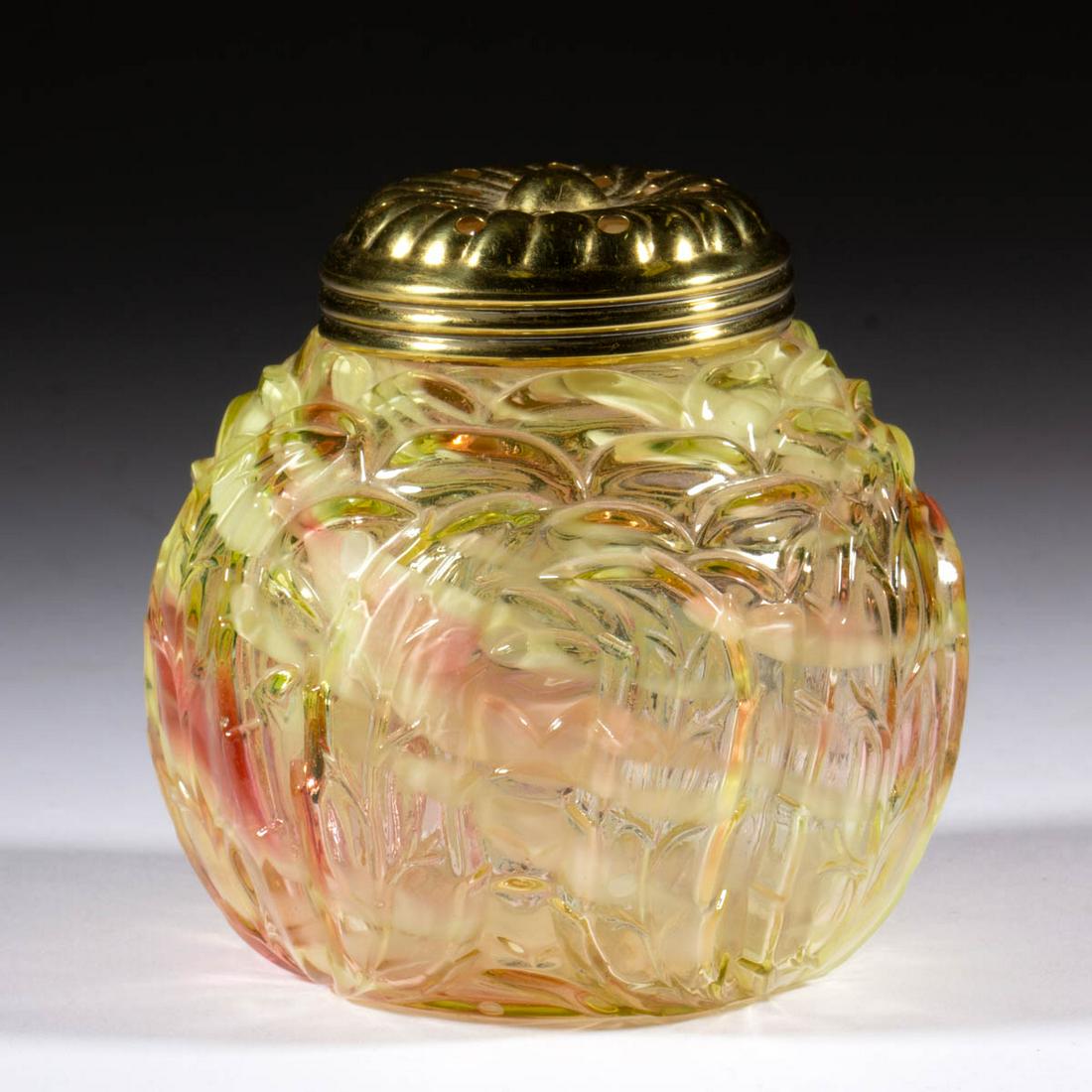 NORTHWOOD NO. 333 / LEAF MOLD SUGAR SHAKER: NORTHWOOD NO. 333 / LEAF MOLD SUGAR SHAKER, canary/Vaseline (reacts under black light) with cranberry and opal spatter, period lid. Northwood Glass Co. Pattern introduced in 1891. 3 3/4" H. Undamaged.