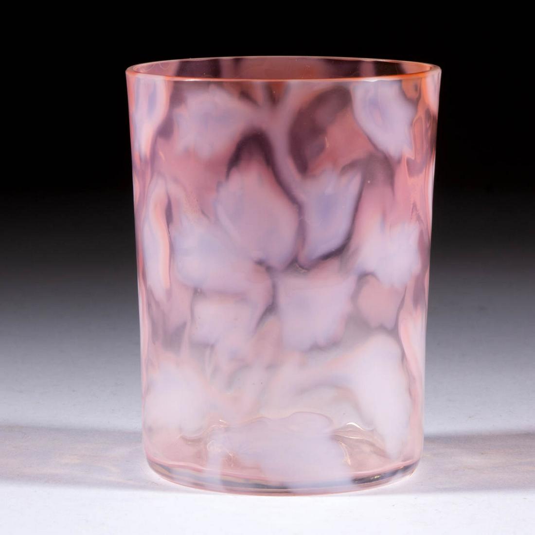 UNIDENTIFIED FLORAL PATTERN TUMBLER: UNIDENTIFIED FLORAL PATTERN TUMBLER, peach opalescent, factory-polished rim. Maker unverified. Late 19th/early 20th century. 3 1/2" H. Undamaged.