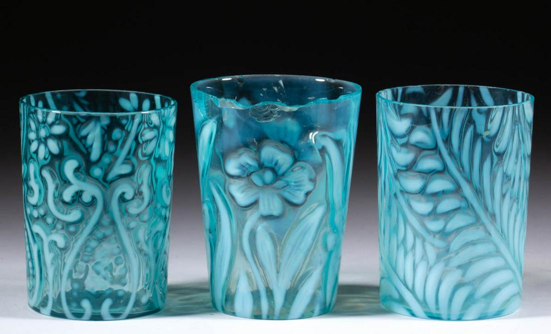 ASSORTED BLOWN OPALESCENT TUMBLERS, LOT OF THREE: ASSORTED BLOWN OPALESCENT TUMBLERS, LOT OF THREE, blue opalescent, comprising an Arabian Nights, a Daffodil, and a Fern example. Various makers. Late 19th/early 20th century. 3 3/4" to 3 7/8" H. Arabi