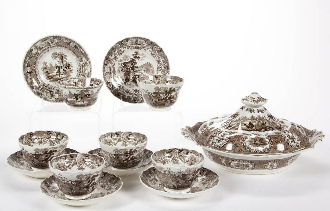 ENGLISH STAFFORDSHIRE TRANSFER-PRINTED CERAMIC TABLE: ENGLISH STAFFORDSHIRE TRANSFER-PRINTED CERAMIC TABLE AND TEA ARTICLES, LOT OF 13, each having brown/sepia transfer motifs, including a covered server featuring "Oriental" pattern, as printed to unders