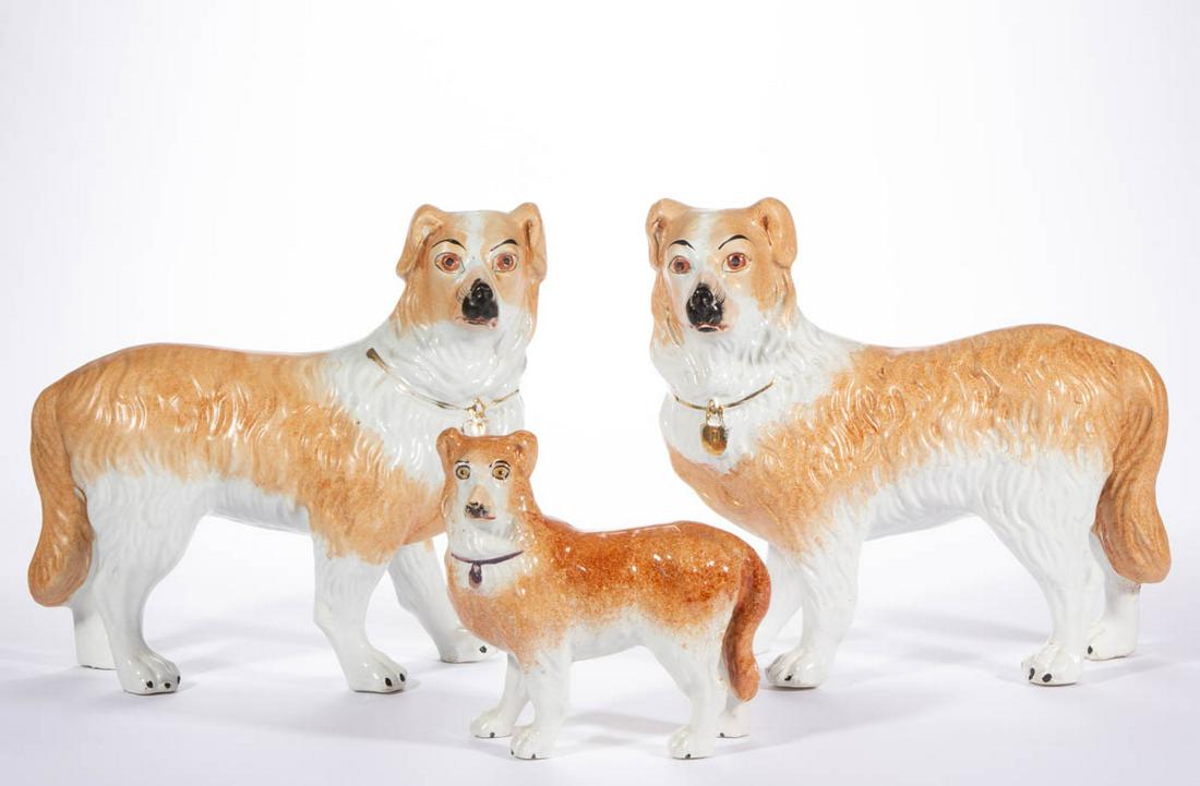ENGLISH STAFFORDSHIRE HAND-PAINTED CERAMIC COLLIE / DOG: ENGLISH STAFFORDSHIRE HAND-PAINTED CERAMIC COLLIE / DOG FIGURES, LOT OF THREE, each having brown and white fur, standing with gilt or lustre collar and locket, comprising a matching pair and one 6 7/8