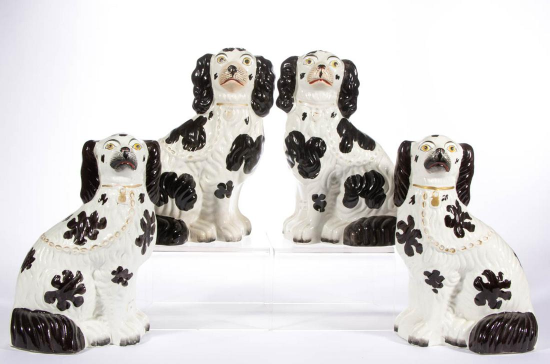 ENGLISH STAFFORDSHIRE HAND-PAINTED CERAMIC SPANIEL /: ENGLISH STAFFORDSHIRE HAND-PAINTED CERAMIC SPANIEL / DOG PAIRS, LOT OF TWO, each having black and white fur and gilt collar with locket and chain, comprising one pair with black muzzles and one having