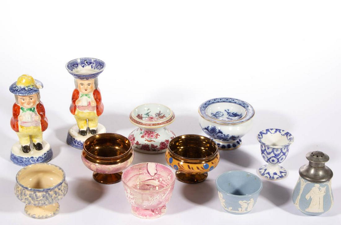 ENGLISH CERAMIC TABLE ARTICLES, LOT OF 11: ENGLISH CERAMIC TABLE ARTICLES, LOT OF 11, including six open salts having two copper lustre examples, a Toby form salt and mustard, each holding a mug with bright polychrome decoration, an egg cup wi