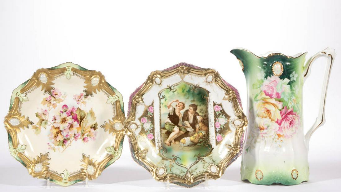 R.S. PRUSSIA JEWEL-DECORATED PORCELAIN TABLE ARTICLES,: R.S. PRUSSIA JEWEL-DECORATED PORCELAIN TABLE ARTICLES, LOT OF THREE, comprising two 8 1/2" D Mold 18 plates, including one featuring image of Murilloâ€™s "Melon Eaters" depicting children eating 