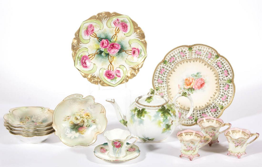 R.S. PRUSSIA / R.S. GERMANY PORCELAIN TEA AND TABLE: R.S. PRUSSIA / R.S. GERMANY PORCELAIN TEA AND TABLE ARTICLES, LOT OF 13, including a globular form teapot with molded ivy decoration, three Mold 704 cups with delicate pink rose motif, a 7 1/2" D Mold