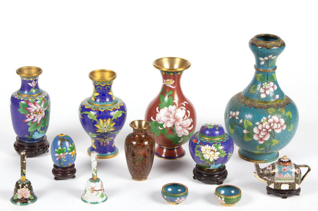 CHINESE / JAPANESE CLOISONNE ARTICLES, LOT OF 12: CHINESE / JAPANESE CLOISONNE ARTICLES, LOT OF 12, five vases, small ginger jar, two salt cellars, two small bells, an egg, and an elephant-form teapot. Four pieces with wooden stands. 20th century. 1"