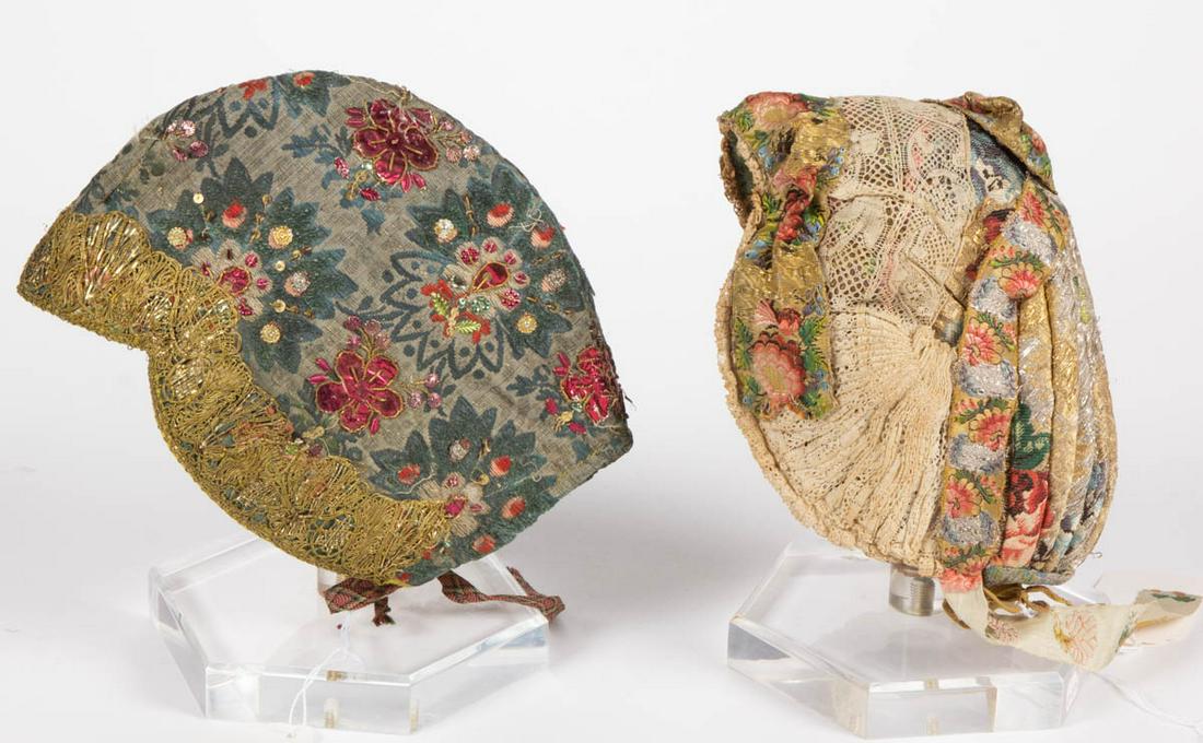 GERMAN / AUSTRIAN FLORAL-PATTERNED HAUBE FOLK: GERMAN / AUSTRIAN FLORAL-PATTERNED HAUBE FOLK HEADDRESSES, LOT OF TWO, each cap-form bonnet with floral-patterned fabric with gilt-thread accents, comprising one possibly of the Silesia or Riesengebir