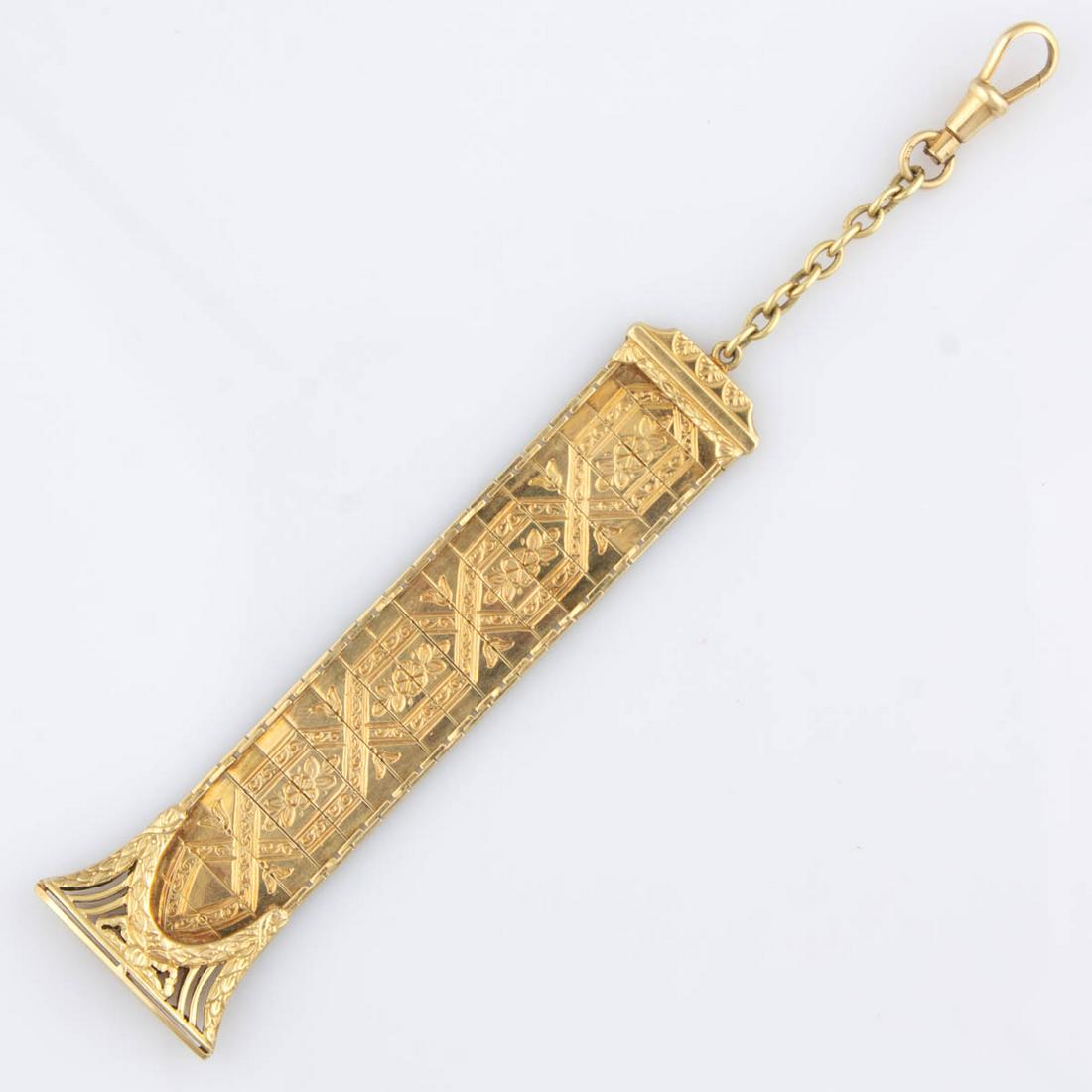 ANTIQUE 14K YELLOW GOLD POCKET WATCH FOB / CHAIN: ANTIQUE 14K YELLOW GOLD POCKET WATCH FOB / CHAIN, having a ribbon-type link chain featuring engraved floral design and a seal-type tip with "KS" initials on the base, suspended from a short cable chai
