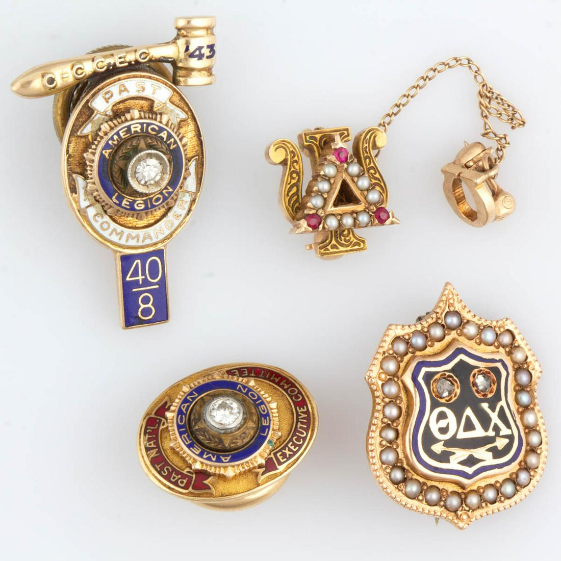ANTIQUE / VINTAGE 10K AND 14K YELLOW GOLD SOCIETY PINS,: ANTIQUE / VINTAGE 10K AND 14K YELLOW GOLD SOCIETY PINS, LOT OF FOUR, comprising a tested 10K Theta Delta Chi fraternity example with two melee diamonds, 26 seed pearls, and "Fred P. Ladd / Brown Unive