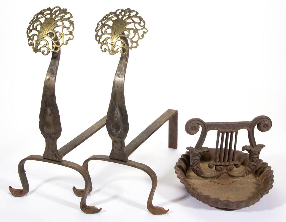 VIRGINIA METALCRAFTERS CAST-IRON BOOT SCRAPER: VIRGINIA METALCRAFTERS CAST-IRON BOOT SCRAPER, in the form of a lyre. Together with a pair of unmarked andirons with brass finials, possibly Virginia Metalcrafters. Three pieces total. 20th century. A