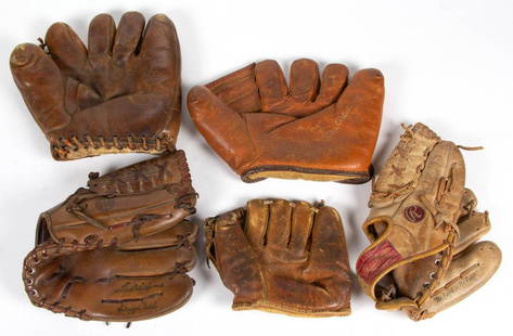 ASSORTED VINTAGE BASEBALL GLOVES / MITTS, LOT OF FIVE: ASSORTED VINTAGE BASEBALL GLOVES / MITTS, LOT OF FIVE, including Tru Sport "Tex Hughson", Rawlings "Reggie Jackson", and Ted Williams. 20th century. Hughson 10" W.As-found condition.Provenance: From a