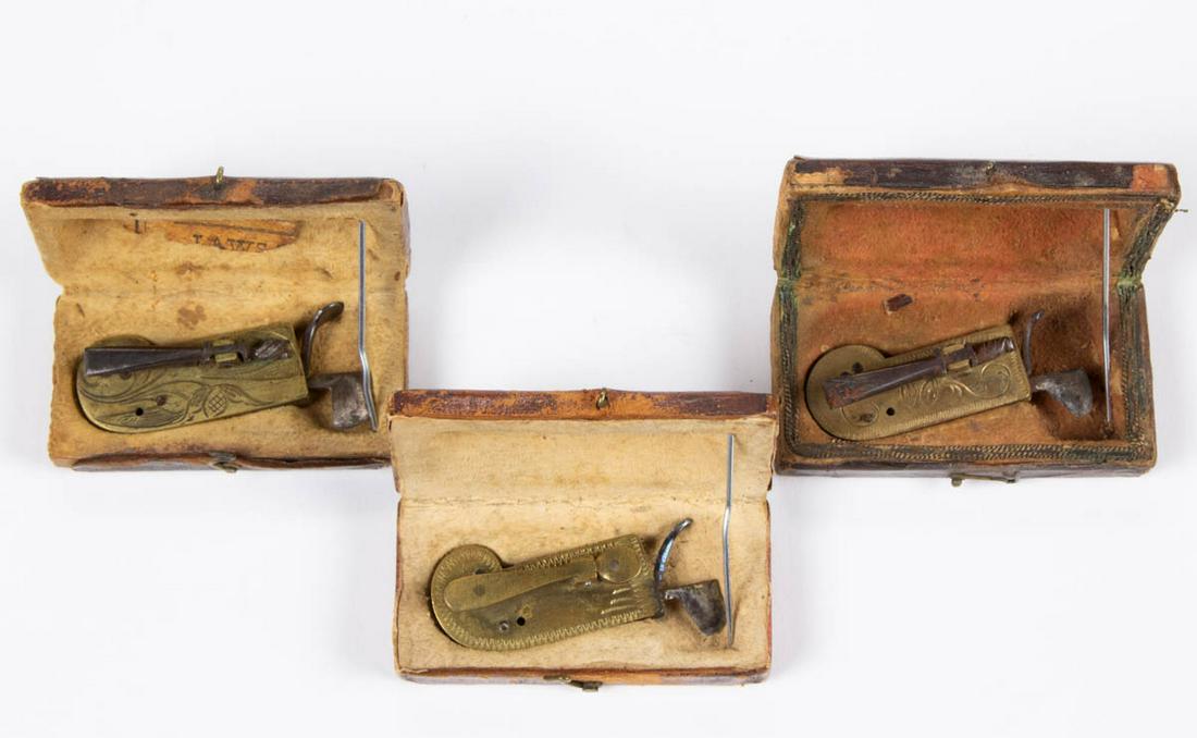 ENGRAVED BRASS AND STEEL SPRING-LOADED SURGICAL (1 of 4)