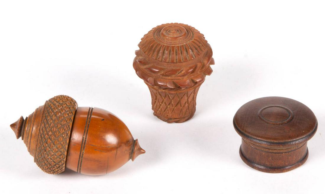 ASSORTED CARVED NUTMEG / SPICE GRATERS, LOT OF THREE: ASSORTED CARVED NUTMEG / SPICE GRATERS, LOT OF THREE, each fitted with a sheet-iron grater, comprising two examples with a threaded cover consisting of a carved figural acorn example with interior hav