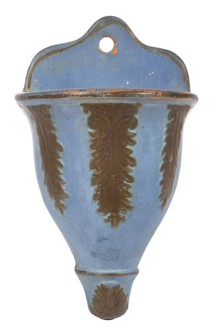 AMERICAN MOLDED AND PAINTED EARTHENWARE / REDWARE WALL: AMERICAN MOLDED AND PAINTED EARTHENWARE / REDWARE WALL POCKET, flat-back urn form with acanthus leaf ornaments, scallop-top back with hanging hole. Original dry powder blue and gold paint. Circa 1880.