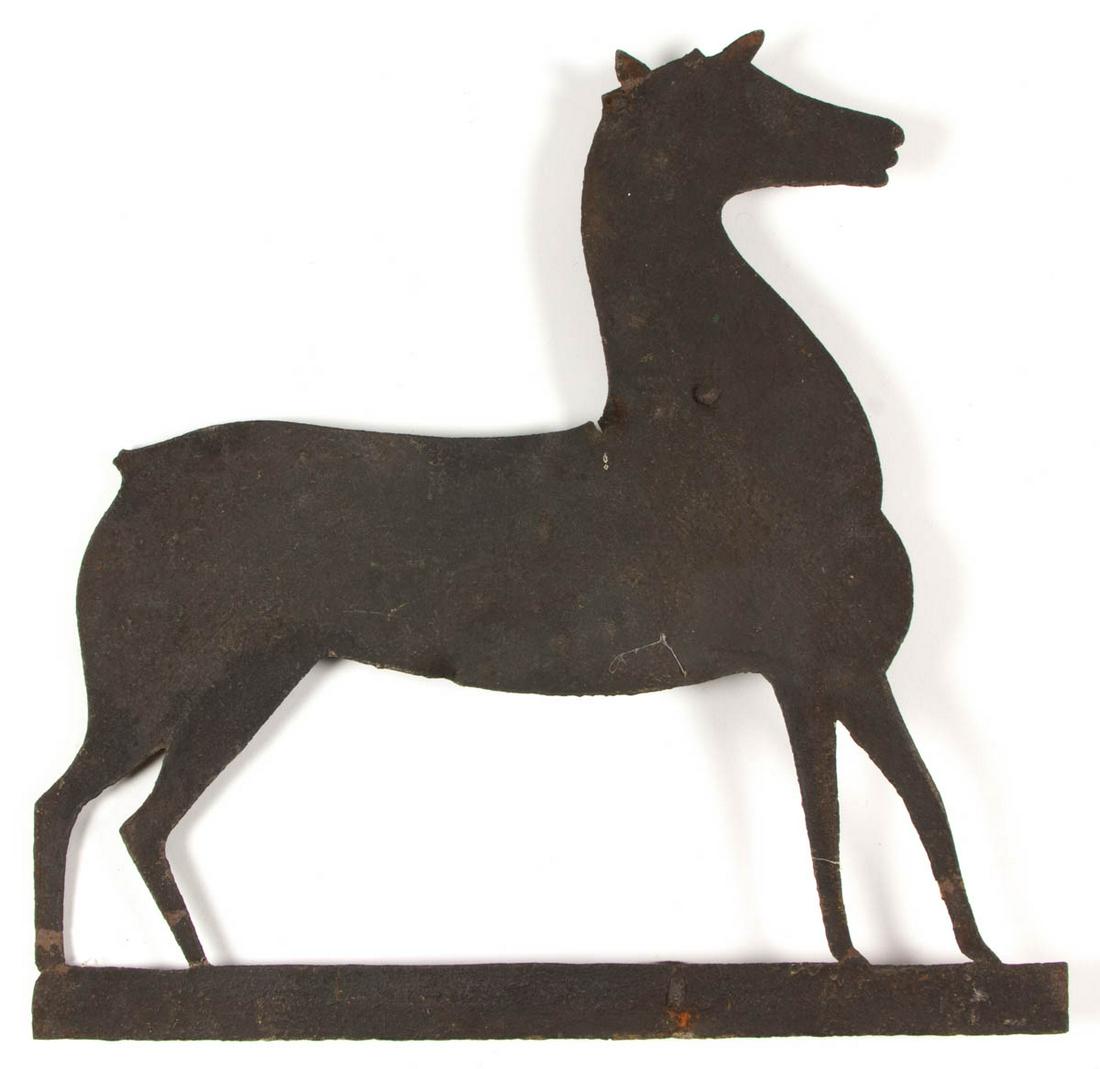 FOLK ART CUT-OUT SHEET-IRON DEER WEATHERVANE: FOLK ART CUT-OUT SHEET-IRON DEER WEATHERVANE, standing figure with weathered surface. Second half 19th century. 18" HOA, 18 1/2" LOA.As-found condition with expected wear, lacking antlers and portion