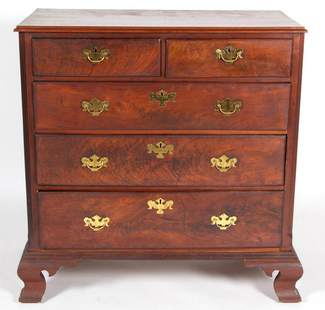 PENNSYLVANIA CHIPPENDALE WALNUT CHEST OF DRAWERS: PENNSYLVANIA CHIPPENDALE WALNUT CHEST OF DRAWERS, molded-edge rectangular top, above two-over-three molded dovetailed drawers flanked by fluted quarter columns, solid ends, the whole raised on ogee br