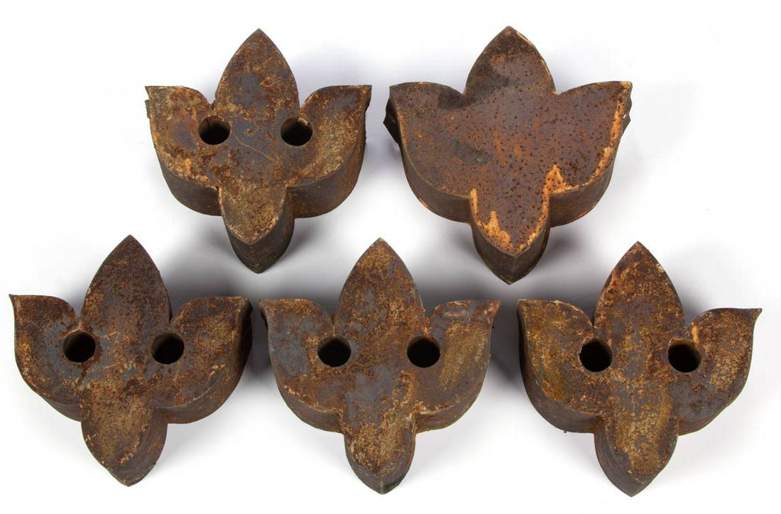 VINTAGE SHEET-IRON / TIN ARCHITECTURAL ORNAMENTS, LOT: VINTAGE SHEET-IRON / TIN ARCHITECTURAL ORNAMENTS, LOT OF FIVE, each of fleur-de-lis form with weathered surface. 20th century. Each 7" HOA, 7" WOA.Good overall condition with expected wear.Provenance: