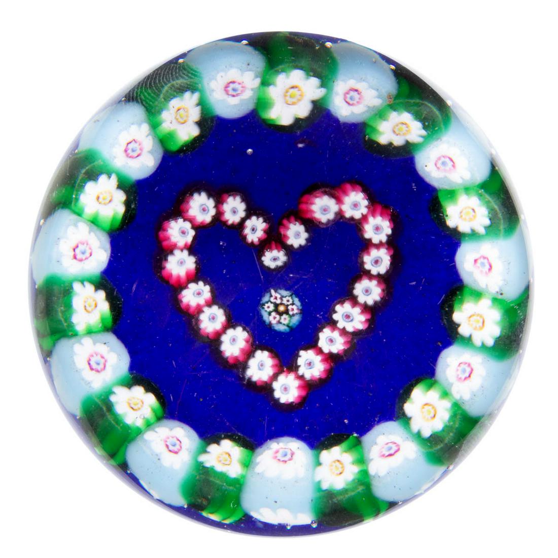 EARLY PAUL YSART (SCOTTISH, 1904-1979) ATTRIBUTED HEART: EARLY PAUL YSART (SCOTTISH, 1904-1979) ATTRIBUTED HEART MILLEFIORI ART GLASS PAPERWEIGHT, encasement having a grey tint, small central powder blue complex cane encircled by matching fuchsia and white 