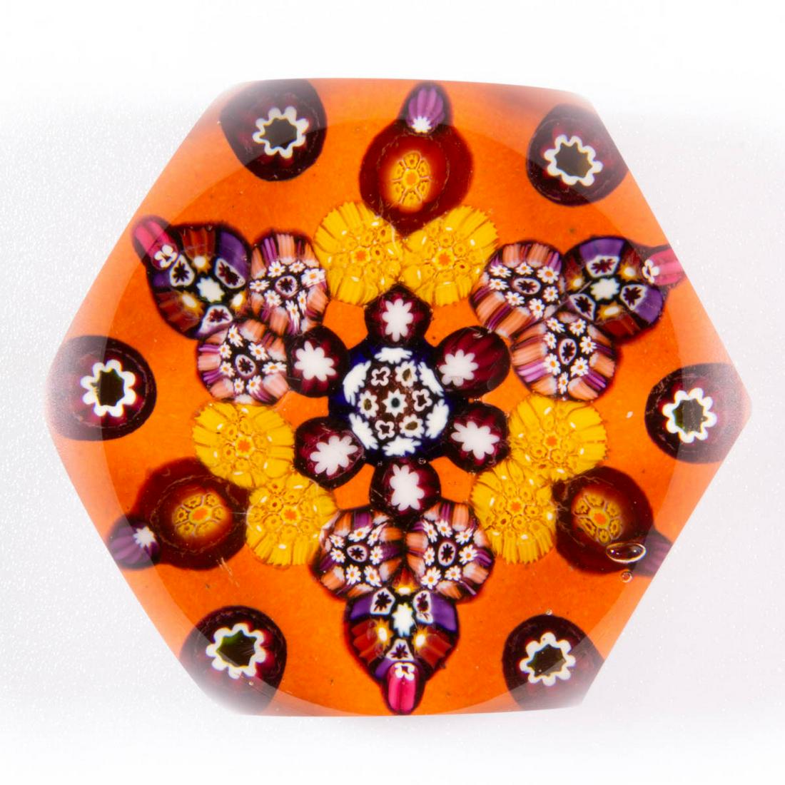 EARLY PAUL YSART (SCOTTISH, 1904-1979) ATTRIBUTED: EARLY PAUL YSART (SCOTTISH, 1904-1979) ATTRIBUTED SIX-POINT STAR MILLEFIORI ART GLASS PAPERWEIGHT, encasement having a grey tint, faceted, central millefiori medallion with an adjacent spaced interior