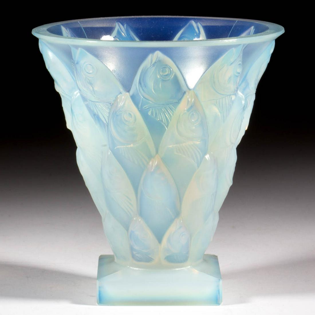 SABINO POISSONS OPALESCENT GLASS VASE: SABINO POISSONS OPALESCENT GLASS VASE, conical vase with upright, overlapping fish, raised on a square base, signed "Sabino/Paris" to the underside, also signed to the pattern. France. 20th century. 5