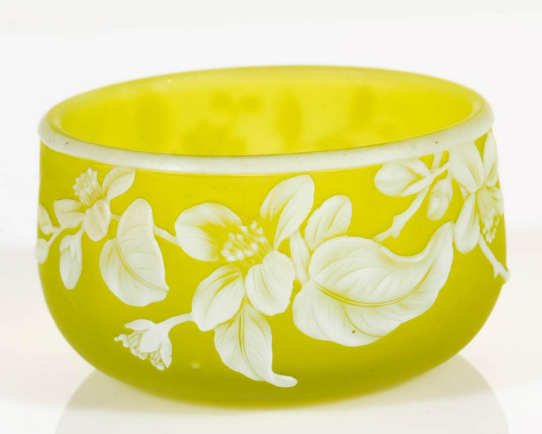 ENGLISH CAMEO ART GLASS OPEN SALT: ENGLISH CAMEO ART GLASS OPEN SALT, white to canary yellow, flowering vine design, factory-polished base and pontil mark. Thomas Webb or Stevens and Williams. Fourth quarter 19th century. 1 1/2" H, 2 5